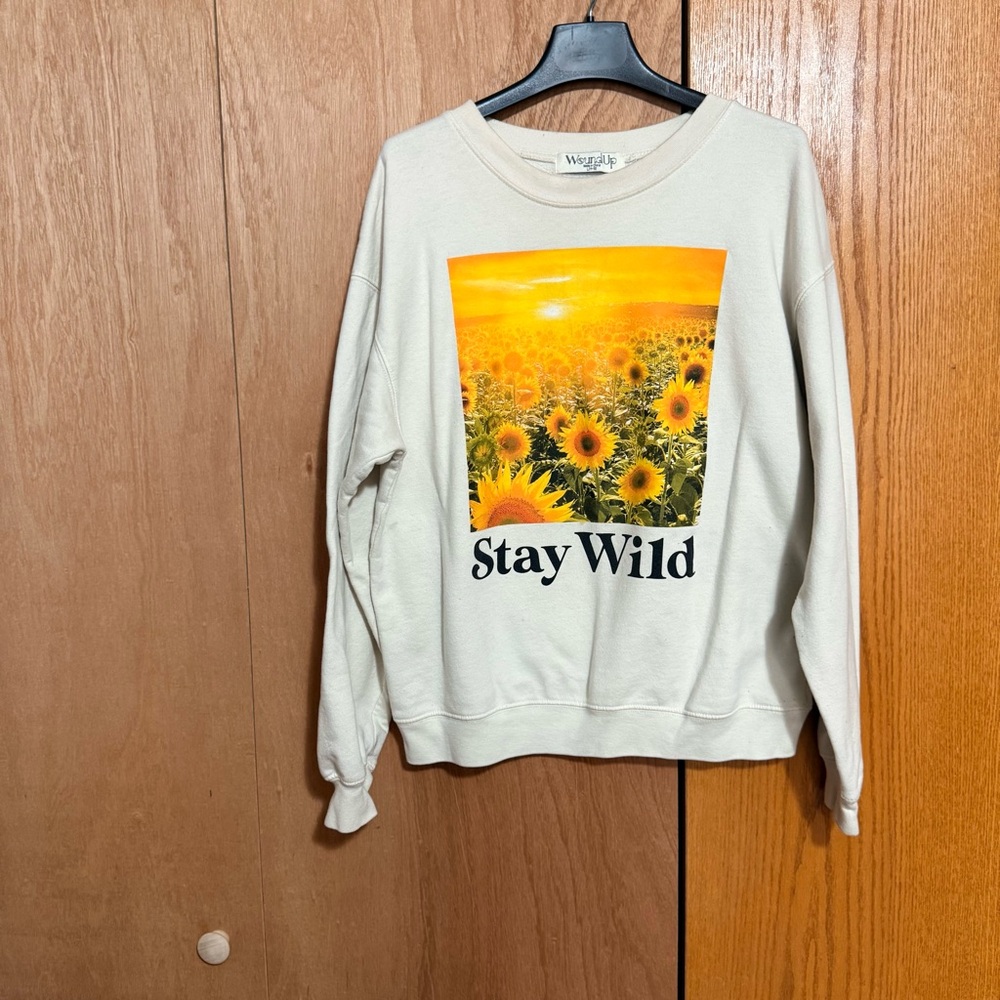 Wound Up Cream Sweatshirt with Yellow Sunflower Graphic